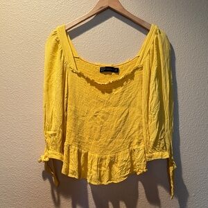 New York & Company beautiful Yellow stretch peplum Blouse